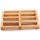 Tradičný drevený masážny prístroj na chodidlá